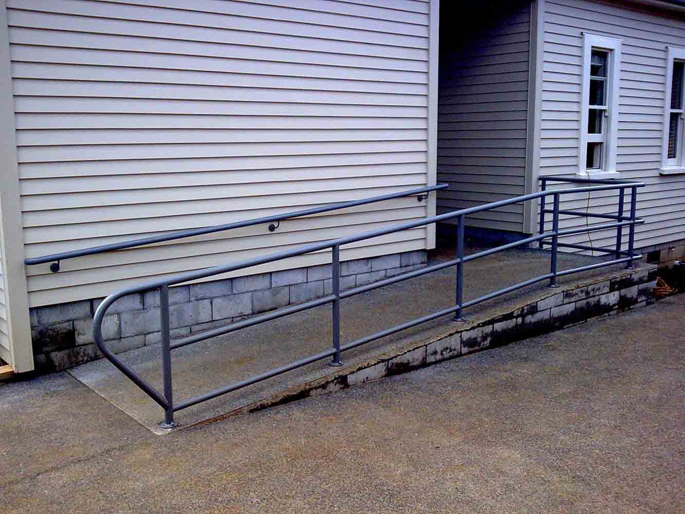 Fabricated metal access ramp and handrails