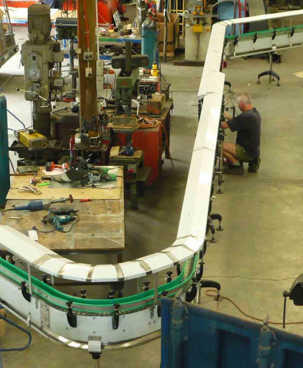 Product handling conveyor being assembled in the WSL workshop