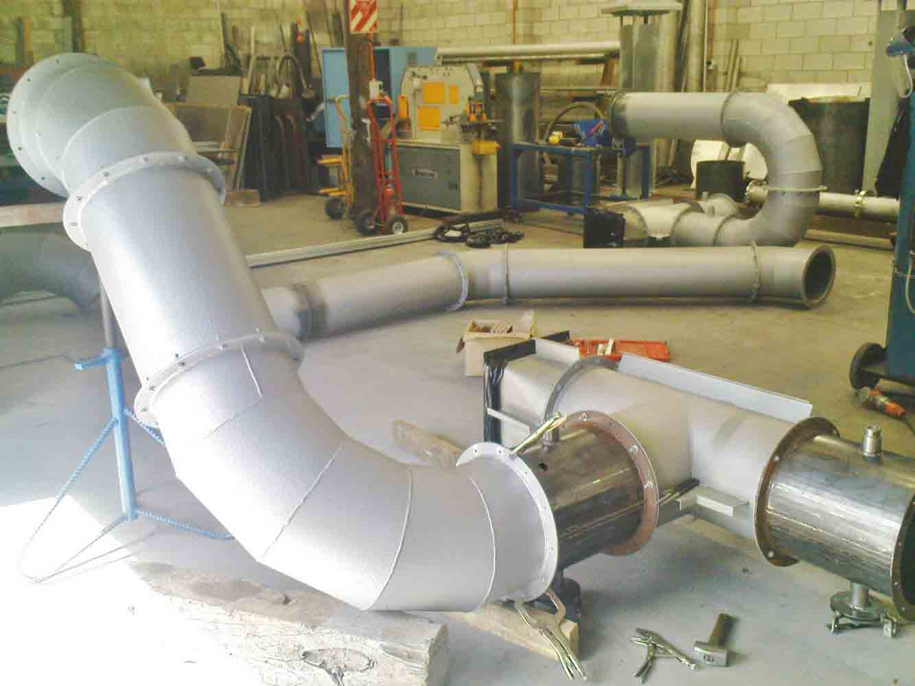 Heavy fabricated ducting sections prepared in the workshop
