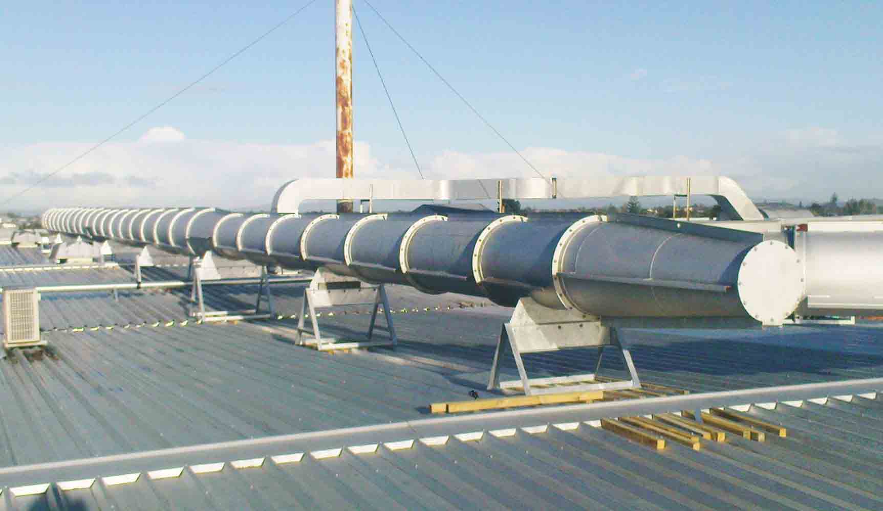 Large industrial ducting system fabricated and installed across a factory roof